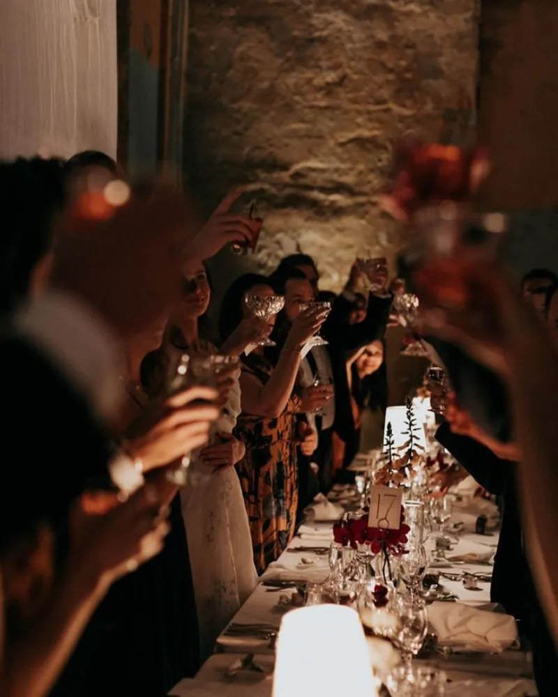 A long candlelit dinner table