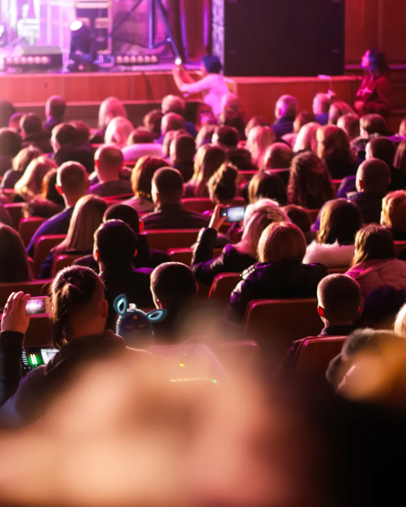 An audience awaiting a performance