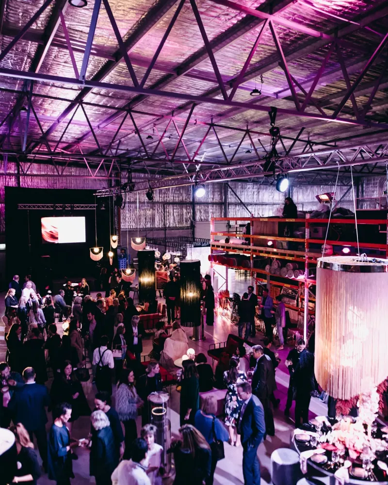 A gathering under festoon lights