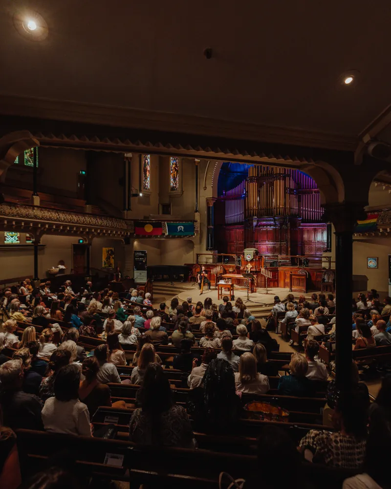 A packed hall for an evening event